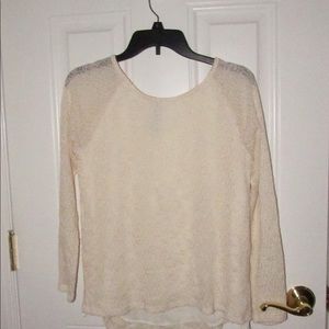 Cream colored long sleeve shirt
